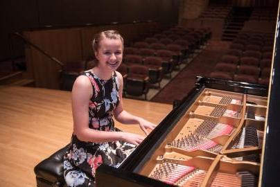 Student playing piano